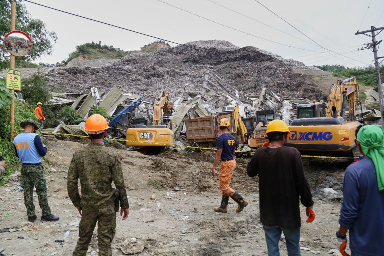 4phil-1767936727 Search and rescue operation continues after a huge mound of garbage collapsed at a waste segregation facility in Binaliw, Cebu city on Friday, Jan. 9, 2026. (AP Photo/Jacqueline Hernandez)