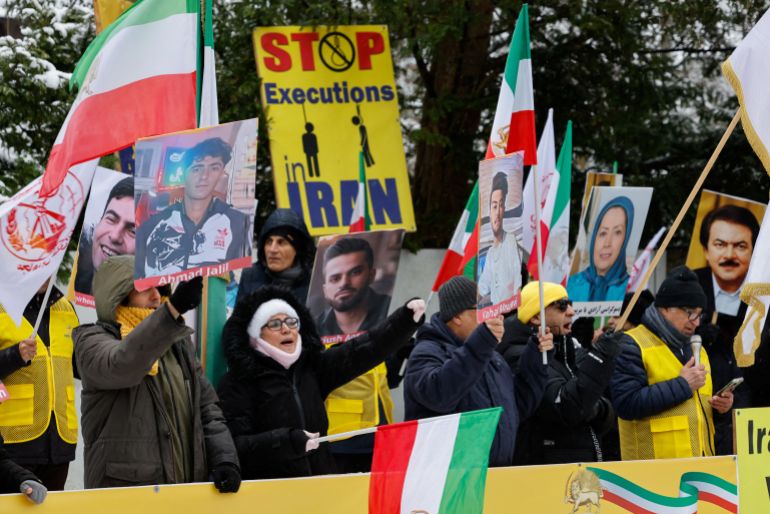 56-1767824158 Supporters of the Iranian opposition group, the National Council of Resistance of Iran, protest to demand an immediate stop to the violence against protesters in Iran and an end to detentions and repression, in Berlin, Germany, January 3, 2026. REUTERS/Axel Schmidt