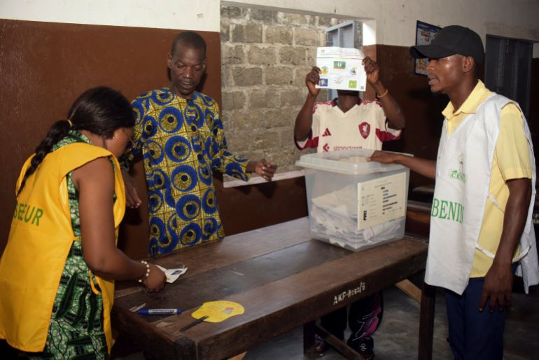 Electoral workers count votes during the parliamentary election at a polling station in Cotonou, Benin, January 11, 2026. REUTERS/Charles Placide Tossou