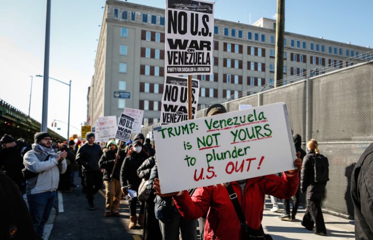 People take part in a demonstration against US military action in Venezuela outside the Metropolitan Detention Center, where ousted Venezuelan President Nicolas Maduro is being held, in the Brooklyn borough of New York City, on January 4, 2026.