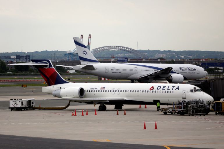 El Al Airlines Flight 28, background, prepares for takeoff from Newark Liberty International Airport en route to Tel Aviv's Ben Gurion Airport, Thursday, July 24, 2014, in Newark, N.J. El Al Airlines continued its normal flight schedules to Israel during a two-day hiatus by U.S. airlines precipitated by the war between Israel and Hamas members in the Gaza Strip. Wednesday evening, the Federal Aviation Administration lifted its ban on U.S. flights in and out of Israel. (AP Photo)
