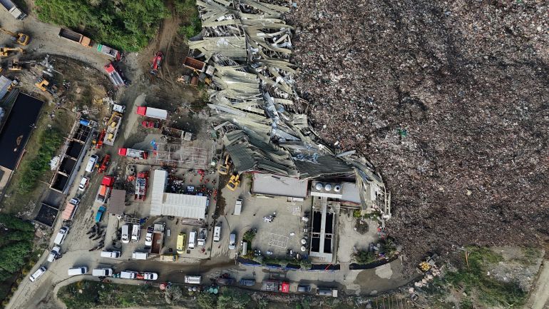 ap_69608b40c15d4-1767934784 An aerial view after a huge mound of garbage collapsed at a waste segregation facility in Binaliw, Cebu city on Friday, Jan. 9, 2026. (AP Photo/Jacqueline Hernandez)