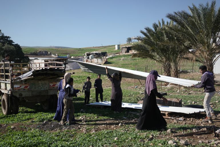ap_6963f0ed9d0c4-1768157421-1 Palestinian residents of Ras Ein al-Auja village, West Bank pack up their belongings and prepare to leave their homes after deciding to flee mounting settler violence, Sunday, Jan. 11, 2026. (AP Photo/Mahmoud Illean)