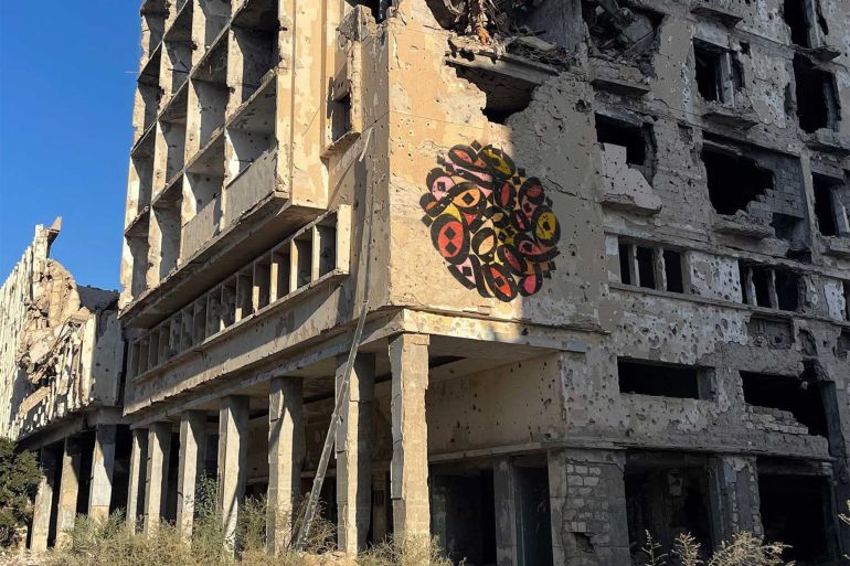 جدارية رقمية للفنان بوليفة في مدينة بنغازي عام 2022 عندما تعذر حصوله على تصريح للرسم الحي