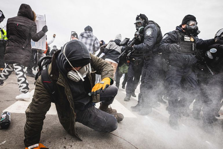 ICE Crackdown 2026: Minneapolis "Operation Metro", Minnesota, USA A protestor is pelted with pepper ball rounds as community members gather at the entrance of the Whipple Building in Minneapolis to rally in solidarity with their neighbors whom are being detained by U.S. ICE (Immigration and Customs Enforcement) agents. By: Dave Decker/ZUMA Press Wire/Shutterstock Location: Minneapolis, United States of America