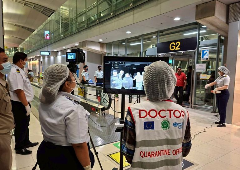 epa12680327 A handout photo released by Suvarnabhumi Airport shows Thai health officials wearing protective masks monitoring passengers from international flights arriving at Suvarnabhumi Airport, Samut Prakan province, Thailand, 25 January 2026. Thailand’s international disease control checkpoints at Suvarnabhumi and Don Mueang International Airports began implementing health screening measures for flights arriving from West Bengal, India, to monitor and prevent Nipah virus infection. The measures started on 25 January 2026, following reports of a Nipah virus outbreak in the area. EPA/THE SUVARNABHUMI AIRPORT OFFICE HANDOUT HANDOUT HANDOUT EDITORIAL USE ONLY/NO SALESHANDOUT EDITORIAL USE ONLY/NO SALES
