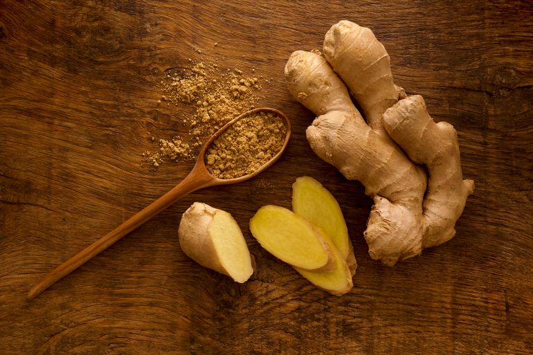 Ginger root and powder, studio shot.