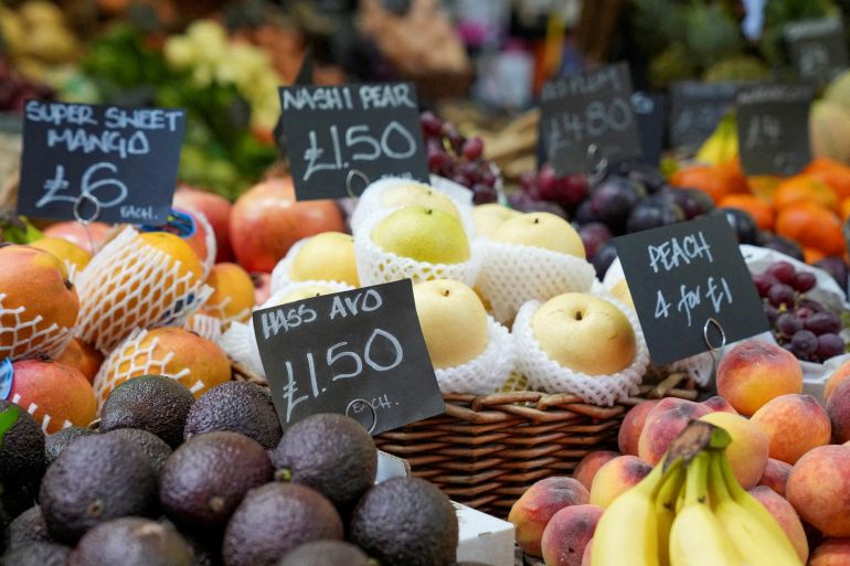 FILE PHOTO: Prices of food are displayed at the Borough Market as the UK inflation rates fall by less than expected in London, Britain May 22, 2024. REUTERS/Maja Smiejkowska/File Photo