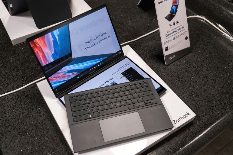 HO CHI MINH, VIETNAM, APRIL 18 2024, Exploring the Innovative Features of the ASUS Zenbook Duo with Dual Screens