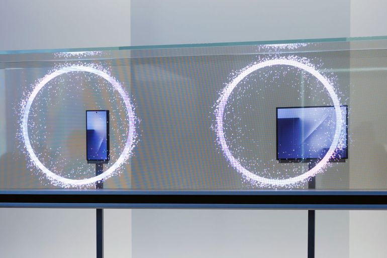 Samsung Electronics Co. Galaxy Z Trifold smartphones on display at the K-Tech Showcase exhibition on the sidelines of the Asia-Pacific Economic Cooperation (APEC) CEO Summit in Gyeongju, South Korea, on Tuesday, Oct. 28, 2025. Samsung Electronics Co. unveiled its highly-anticipated trifold smartphone when world leaders and global dignitaries gather at the APEC summit in South Korea. Photographer: SeongJoon Cho/Bloomberg via Getty Images