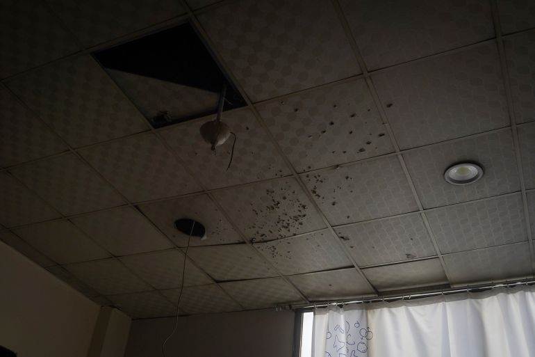 getty_695fc84655-1767884870 ALEPPO, SYRIA - JANUARY 8: Debris from shelling is seen on ceiling panels in the Alrazi Hospital as clashes continue between Syrian Army and Kurdish Forces on January 8, 2026 in Aleppo, Syria. Several people have been killed and more than a dozen injured in clashes that broke out on Tuesday between Syrian government forces and the Kurdish-led and US-backed Syrian Democratic Forces (SDF). Heavy shelling was reportedly launched from the SDF-controlled neighborhoods of Sheikh Maqsoud and al-Ashrafia, striking surrounding areas. The escalation in tensions comes amid the stalled implementation of an agreement reached last year to integrate SDF forces into Syrian state institutions under the interim government. (Photo by Adri Salido/Getty Images)