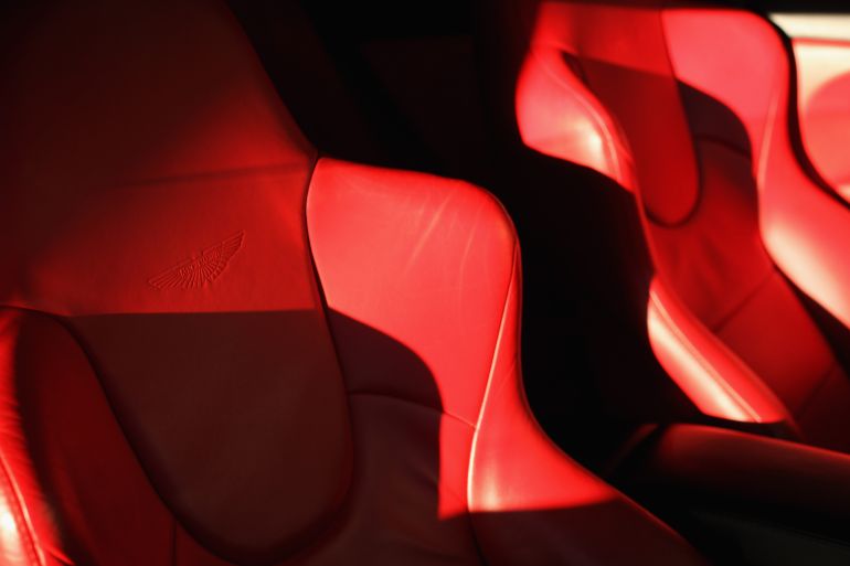 LONDON, ENGLAND - FEBRUARY 01: The leather seats of an Aston Martin Vanquish catches the sunshine in the new 'Heritage' Showroom' in Hammersmith on February 1, 2012 in London, England. The showroom is the UK's first high street 'Heritage' showroom specialising in vintage and classic Aston Martin cars, and opens to the public on February 2, 2012. (Photo by Dan Kitwood/Getty Images)