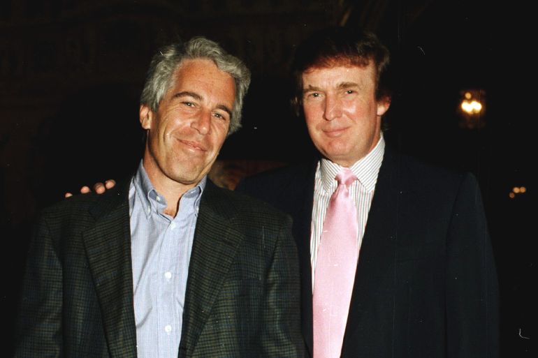 Portrait of American financier Jeffrey Epstein (left) and real estate developer Donald Trump as they pose together at the Mar-a-Lago estate, Palm Beach, Florida on February 22, 1997. (Photo by Davidoff Studios/Getty Images)