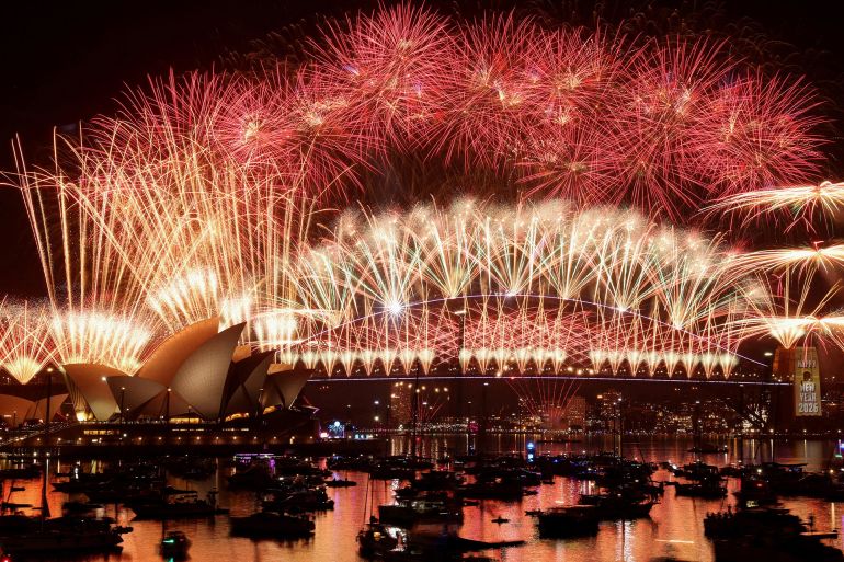 FILE PHOTO: Fireworks explode over Sydney Harbour Bridge to mark the New Year in Sydney, Australia, January 1, 2026. REUTERS/Hollie Adams/File Photo