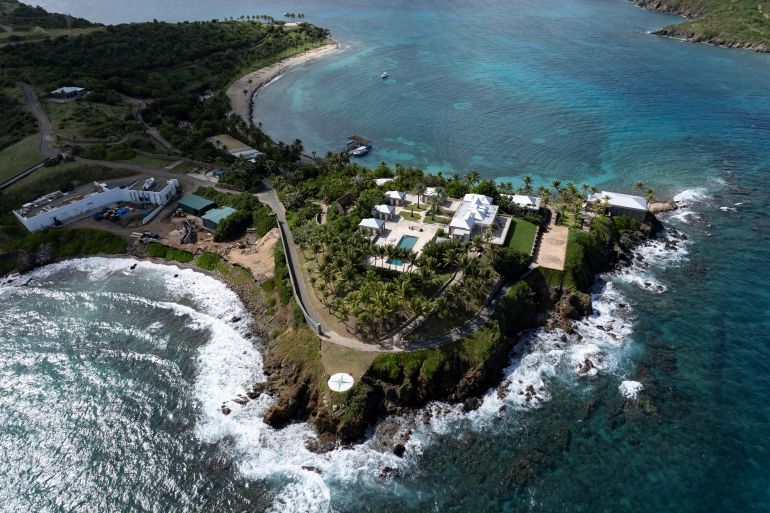 ظهور ترامب وكلينتون وجيتس في مجموعة جديدة من صور إبستين A drone view shows Little St. James, a small private island formerly owned by the late financier Jeffrey Epstein and later sold by his estate to settle lawsuits, in the U.S. Virgin Islands, November 29, 2025. REUTERS/Marco Bello TPX IMAGES OF THE DAY