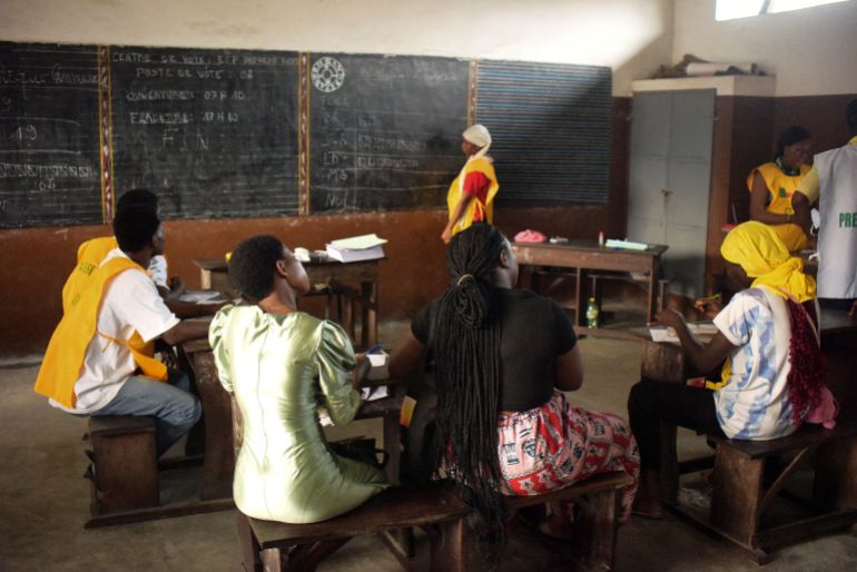 Electoral workers count votes during the parliamentary election at a polling station in Cotonou, Benin, January 11, 2026. REUTERS/Charles Placide Tossou