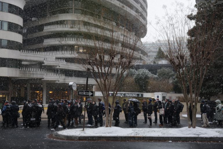 reuters_6932ed56-1764945238 Soccer Football - FIFA World Cup 2026 - FIFA World Cup 2026 Draw - John F. Kennedy Center for the Performing Arts, Washington, D.C., U.S. - December 5, 2025 Media personnel are seen queuing outside the John F. Kennedy Center ahead the FIFA World Cup draw REUTERS/Jeenah Moon
