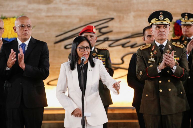 reuters_69648003-1768194051 Venezuela's interim president Delcy Rodriguez, alongside Defence Minister Vladimir Padrino Lopez, delivers a speech, during the ceremony "Promotions and Decorations for Heroes and Martyrs", honouring Venezuelan and Cuban military and security personnel who died during a U.S. operation to capture Venezuela's President Nicolas Maduro and his wife Cilia Flores, in Caracas, Venezuela, January 8, 2026. REUTERS/Leonardo Fernandez Viloria