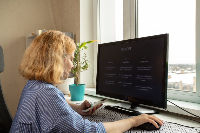 Woman,At,Work,,Using,Chatgpt,On,Computer,Screen,,Ai,Conversation,
