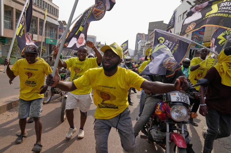 Supporters of Ugandan President Yoweri Museveni celebrate his victory in the presidential election in Kampala, Uganda, Saturday, Jan. 17, 2026. (AP Photo/Brian Inganga)