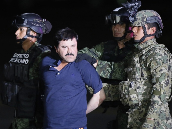 a161293d-8b29-4ae5-9a7e-590e52fae1db Alleged fugitive Mexican drug lord Joaquin 'El Chapo' Guzman is escorted by the authorities to a Mexican Army helicopter in Los Mochis, Sinaloa, Mexico, 08 January 2016, to be transferred to the prison from which he escaped on 11 July 2015. Guzman, allegedly one of the world's most powerful drug lords, made his second escape from a high-security prison in July 2015 using a series of sophisticated tunnels. The suspected head of the Sinaloa cartel was recaptured on 08 January in the town of Los Mochis near the Pacific Coast in his home state of Sinaloa, the Milenio newspaper reported citing Mexican security authorities.