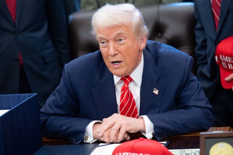 afp_6982847e78bf-1770161278-1 US President Donald Trump speaks with the media after signing a funding bill to end a partial government shutdown in the Oval Office of the White House in Washington, DC, February 3, 2026.