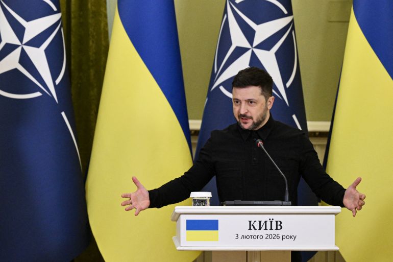 afp_6982da66242a-1770183270 Ukraine's President Volodymyr Zelensky gestures as he delivers a press conference with Secretary General of NATO following their meeting in Kyiv on February 3, 2026, amid the Russian invasion in Ukraine. (Photo by Genya SAVILOV / AFP)