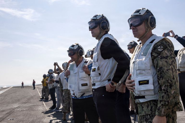 afp_69883b9d1b4f-1770535837 This handout picture from US Central Command shows US special envoy Steve Witkoff (3rd L) and Jared Kushner (C), US President Donald Trump's son-in-law, and US Navy Adm. Brad Cooper (R), commander of U. Central Command, observing flight operations aboard Nimitz-class aircraft carrier USS Abraham Lincoln (CVN 72) in the Arabian Sea on February 7, 2026.