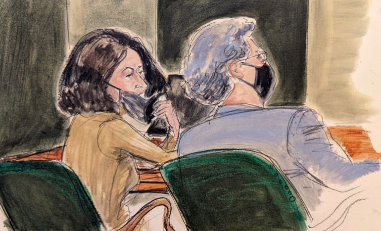 In this courtroom sketch, Ghislaine Maxwell, left, pulls down her mask to talk to one of her lawyers, Jeffrey Pagliuca, during Maxwell's sex trafficking trial, Monday, Dec. 27, 2021, in New York. (AP Photo/Elizabeth Williams)