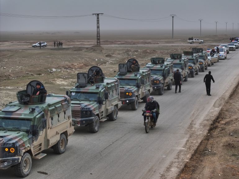 Syrian security forces gather before entering the town of al-Hassakeh to implement an agreement with the Kurdish-led Syrian Democratic Forces (SDF) to stabilize a ceasefire, in Wadi al-Raml, al-Hassakeh province, eastern Syria, Monday, Feb. 2, 2026. (AP Photo/Ghaith Alsayed)