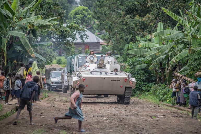 ap_698994a04522e-1770624160 FILE - MONUSCO blue helmet deployed near Kibumba, north of Goma, Democratic Republic of Congo, on Jan. 28, 2022. The accounts are haunting. Abductions, torture, rapes. Scores of civilians including women and children have been killed by the M23 rebels in eastern Congo, according to a U.N. report expected to be published this week. (AP Photo/Moses Sawasawa, File)