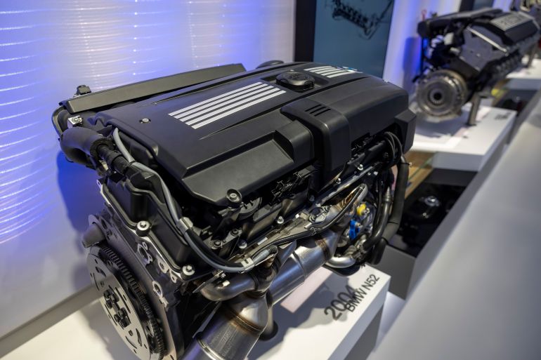 Munich Germany 2025-12-04 BMW N52 inline six engine displayed as a modern naturally aspirated powertrain exhibit in a museum environment.