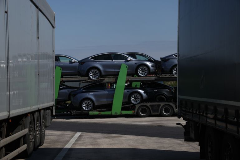 getty_697639d4a3-1769355732 GARBSEN, GERMANY - APRIL 08: Tesla Model Y cars stand on a flatbed truck at a highway rest stop on April 8, 2025 near Garbsen, Germany. Tesla sales in Germany have plummeted in recent months, which analysts attribute to company owner Elon Musk's outspoken support for far-right parties across Europe, including Germany's Alternative for Germany (AfD). (Photo by Sean Gallup/Getty Images)