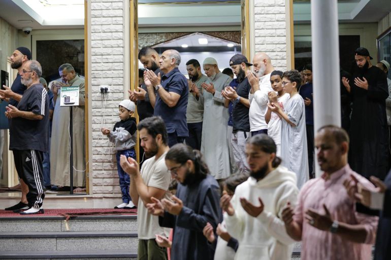 getty_6996d01d27-1771491357 SYDNEY, AUSTRALIA - MARCH 22: Muslim worshipers perform the first Taraweeh prayers at the Lakemba mosque on the first night of Ramadan on March 22, 2023 in Sydney, Australia. The holy fasting month of Ramadan is observed by Muslims around the world, including many in Australia, who adhere to its principles in their own suburban communities. (Photo by Roni Bintang/Getty Images)