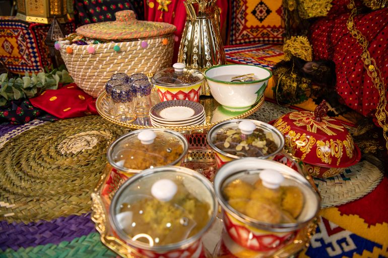 gettyimages-1385793715-1771773095 Doha, Qatar - April 25, 2021: Islamic arts of blue Ramadan lantern as an Arabian Muslim celebration of Ramadan and garangao on oriental red carpet with Islamic geometry background