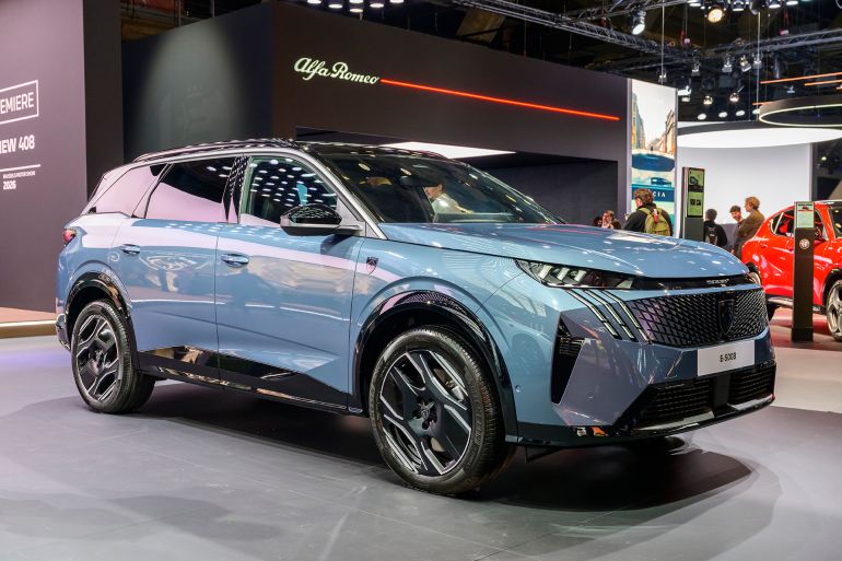 BRUSSELS, BELGIUM - JANUARY 09: Peugeot E-5008 battery electric mid-size crossover SUV on display at the AutoSalon press preview on January 09, 2026 in Brussels, Belgium. The 102nd Brussels Motor Show has firmly established itself on the international calendar, featuring over 60 car brands and more than 20 motorcycle brands, and visited by over 270,000 people. (Photo by Sjoerd van der Wal/Getty Images)