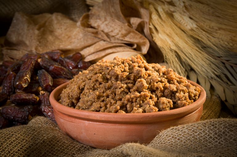 Hunaini, Saudi Arabian -Najdi- Traditional Sweets Made of Dates and Saj Bread Still life with Ingredients