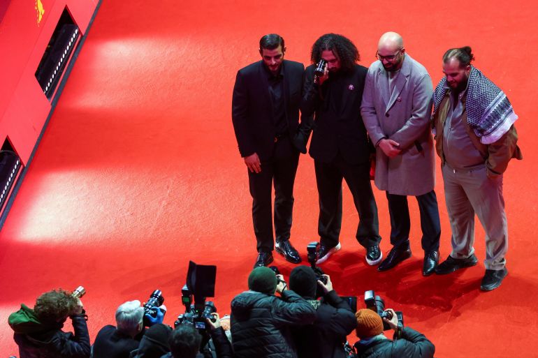 المخرج عبد الله الخطيب في مهرجان برلين Director Abdallah Alkhatib and Taqiyeddine Issaad pose with the GWFF Best Feature Film Debut Award for “Chronicles From the Siege”, at the 76th Berlinale International Film Festival in Berlin, Germany, February 21, 2026. REUTERS/Christian Mang