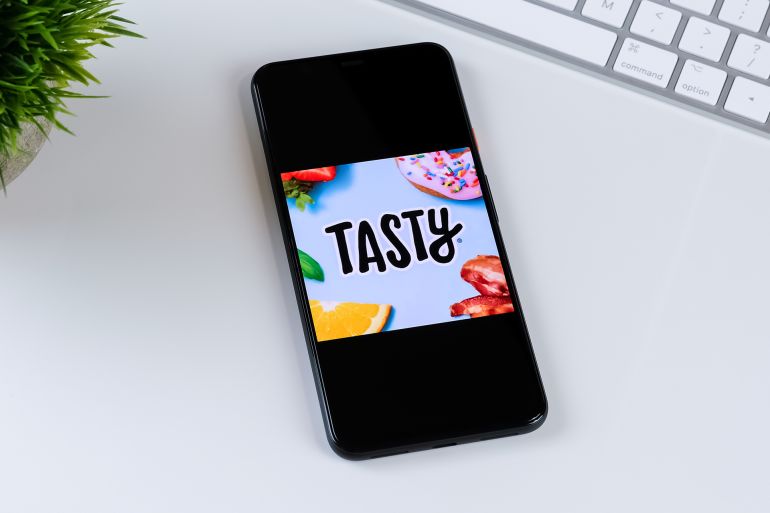Tasty app logo on a smartphone screen. Manhattan, New York, USA May 2, 2020.; Shutterstock ID 1759359149; purchase_order: aj; job: ; client: ; other: