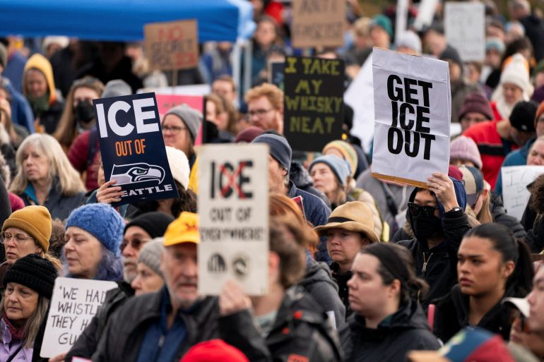 People gather for a protest against increased immigration enforcement, after Renee Nicole Good was fatally shot in Minneapolis by a U.S. Immigration and Customs Enforcement (ICE) agent, in Seattle, Washington, U.S. January 11, 2026. REUTERS/David Ryder