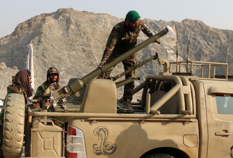 reuters_69a1ef60-1772220256 Taliban soldiers load a rocket launcher in a vehicle, following exchanges of fire between Pakistan and Afghanistan forces, near Torkham border in Afghanistan, February 27, 2026. REUTERS/Stringer TPX IMAGES OF THE DAY