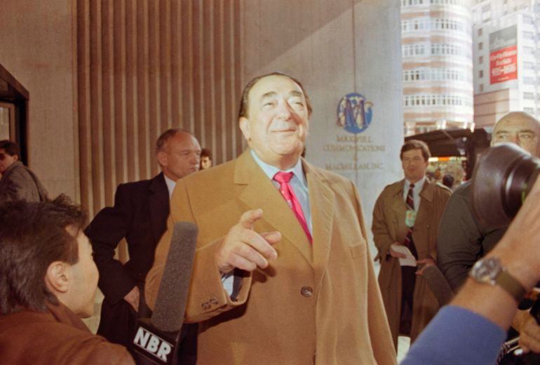British publishing magnate Robert Maxwell talks briefly with reporters as he heads into a meeting with NY Daily News Union leaders in New York City, NY, United States. March 8, 1991 REUTERS/Jeff Christensen 91143040