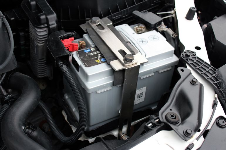 Vinnytsia, Ukraine; November 19, 2022. Honda Accord Coupe 2.4 engine. Honda Accord battery. Honda Accord engine parts. Right view.; Shutterstock ID 2228549877; purchase_order: aj; job: ; client: ; other: