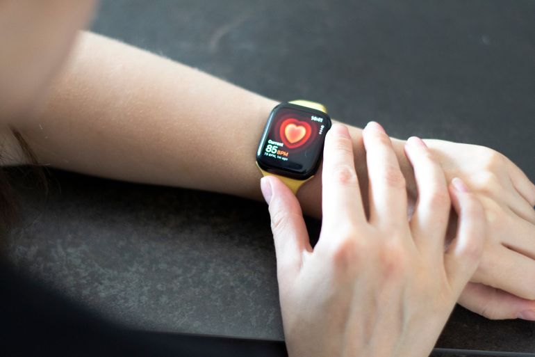 shutterstock_2512099229-1770726518 San Francisco, USA - September 4, 2024: Woman hand with Apple Watch Series 8 measuring heart rate. Apple Watch was created and developed by the Apple inc.