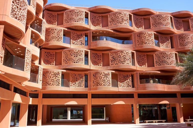 t7ijh-1770373854 the sustainable new district of Masdar city with sustainable facades with zero emission for these apartments.Abu dhabi, united arab emirates, february 14,2020