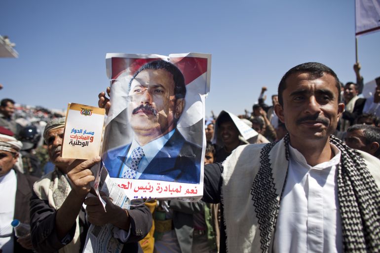 yemeni-protesters-3-1770030358 SANA, YEMEN - MARCH 10: A supporter of President Ali Abdullah Saleh poses for a photograph after the president gave a speech to a packed stadium on March 10, 2011 in Sana, Yemen. Thousands of Yemenis have been protesting around the country calling for the ouster of President Ali Abdullah Saleh, who has been in power for 32 years. (Photo by Jonathan Saruk/Getty Images)