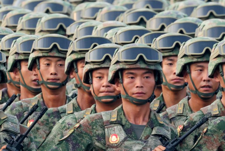 Soldiers of the Chinese People's Liberation Army (PLA) march during the rehearsal ahead of a military parade to mark the 80th anniversary of the end of World War Two, in Beijing, China, September 3, 2025. REUTERS/Maxim Shemetov