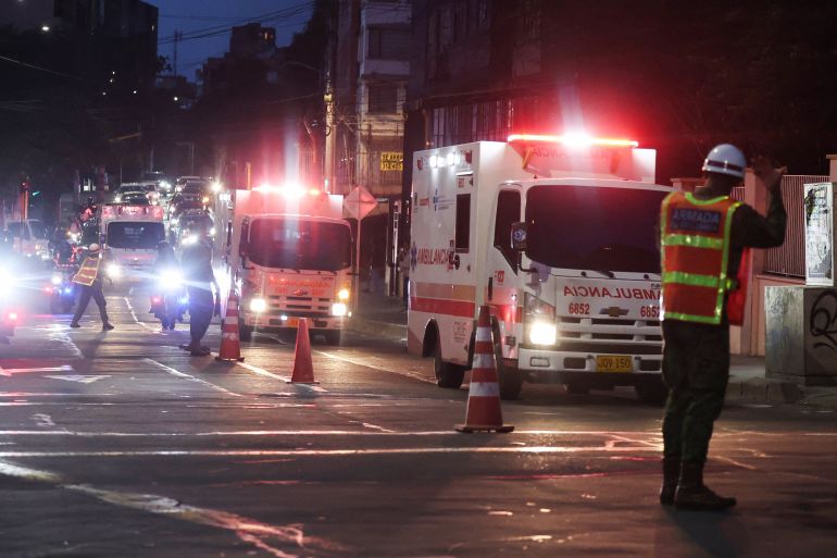 Ambulances arrive at the military hospital carrying people injured in the Colombian Air Force plane crash in Puerto Leguizamo, in Bogota, Colombia, Colombia, March 23, 2026. REUTERS/Luisa Gonzalez