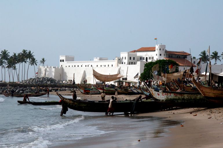 1152862-1774490174 epa00967038 Ghanain fishermen come ashore in front of a 15th century slave fort, one of more than 30 dotted along Ghana's coast, ahead of a commemoration event to mark the 200th anniversary of the abolition of the British transatlantic slave trade held at St Georges Castle, Elmina, Ghana, Sunday 25 March 2007. The event, called 'Reflections' organised by the British Council brought together musicians, poets, choirs and dancers from across Ghana and the African diaspora. Ghana, then called The Gold Coast, was at the heart of the British slave trade which saw millions of Africans taken across the Atlantic Ocean to labour on plantations in the Caribbean and South America. Although slavery was legally abolished 200 years ago, today an estimated 27-million people worldwide are still enslaved. EPA/TUGELA RIDLEY