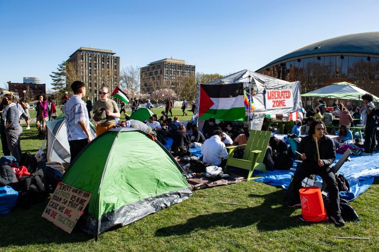 5-1-1714113978 Pro-Palestinian supporters from Harvard University and the Massachusetts Institute of Technology (MIT) rally at MIT at an encampment for Palestine at MIT in Cambridge, Massachusetts, on April 22, 2024. (Photo by Joseph Prezioso / AFP)